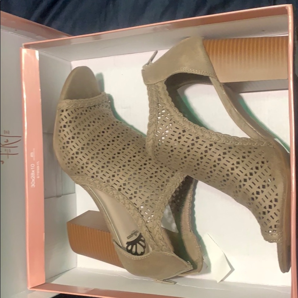 New never worn. Fergalicious heels